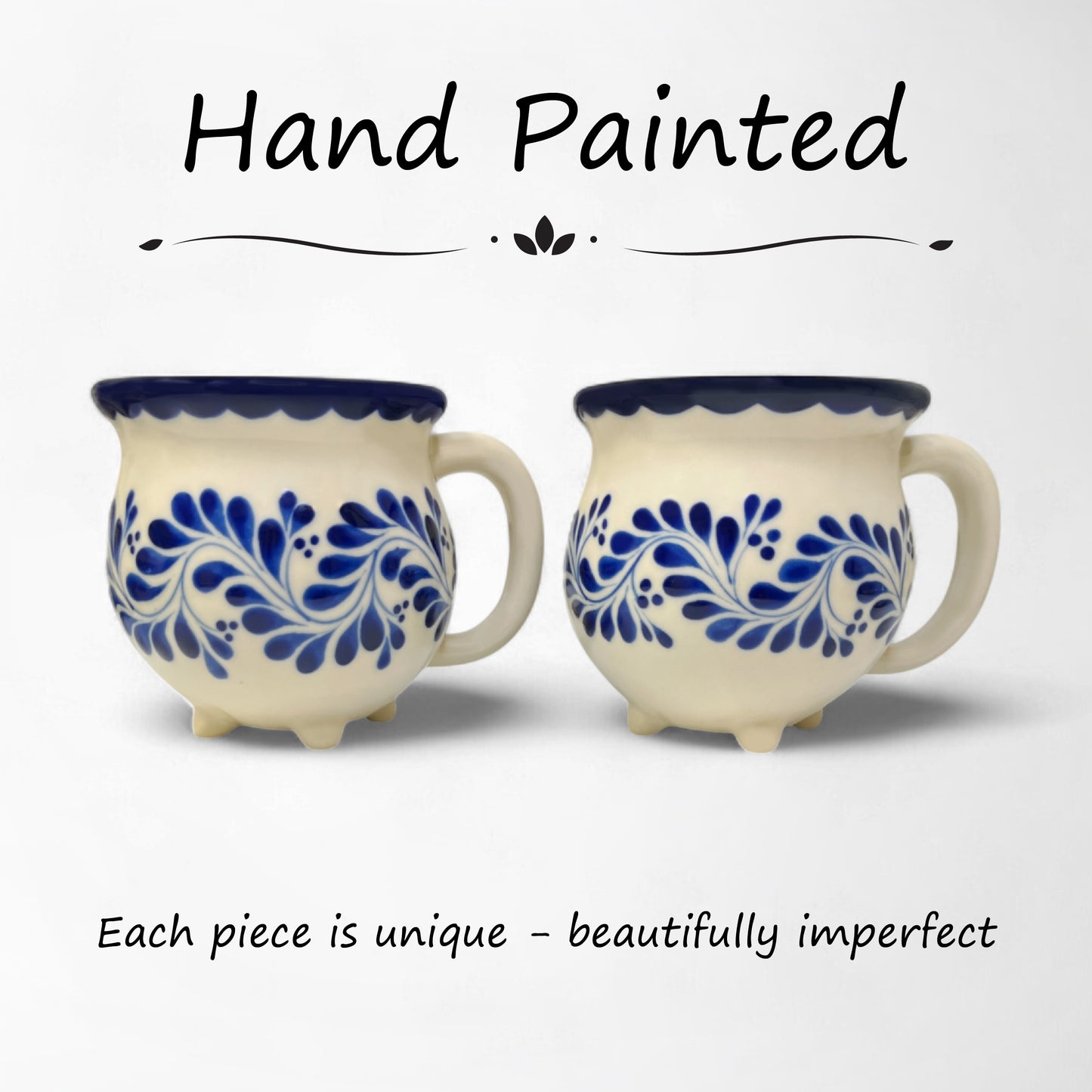 Two decorative ceramic mugs featuring blue cheerful patterns, enhancing kitchen aesthetics.