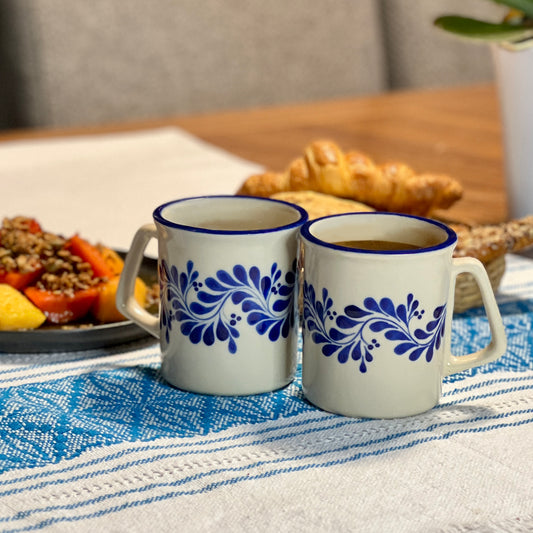 A hand-painted mug set designed for hot drinks. 