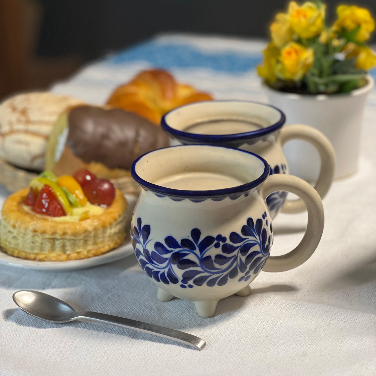 Hand-painted mugs in matching talavera designs, perfect for gifting or personal use
