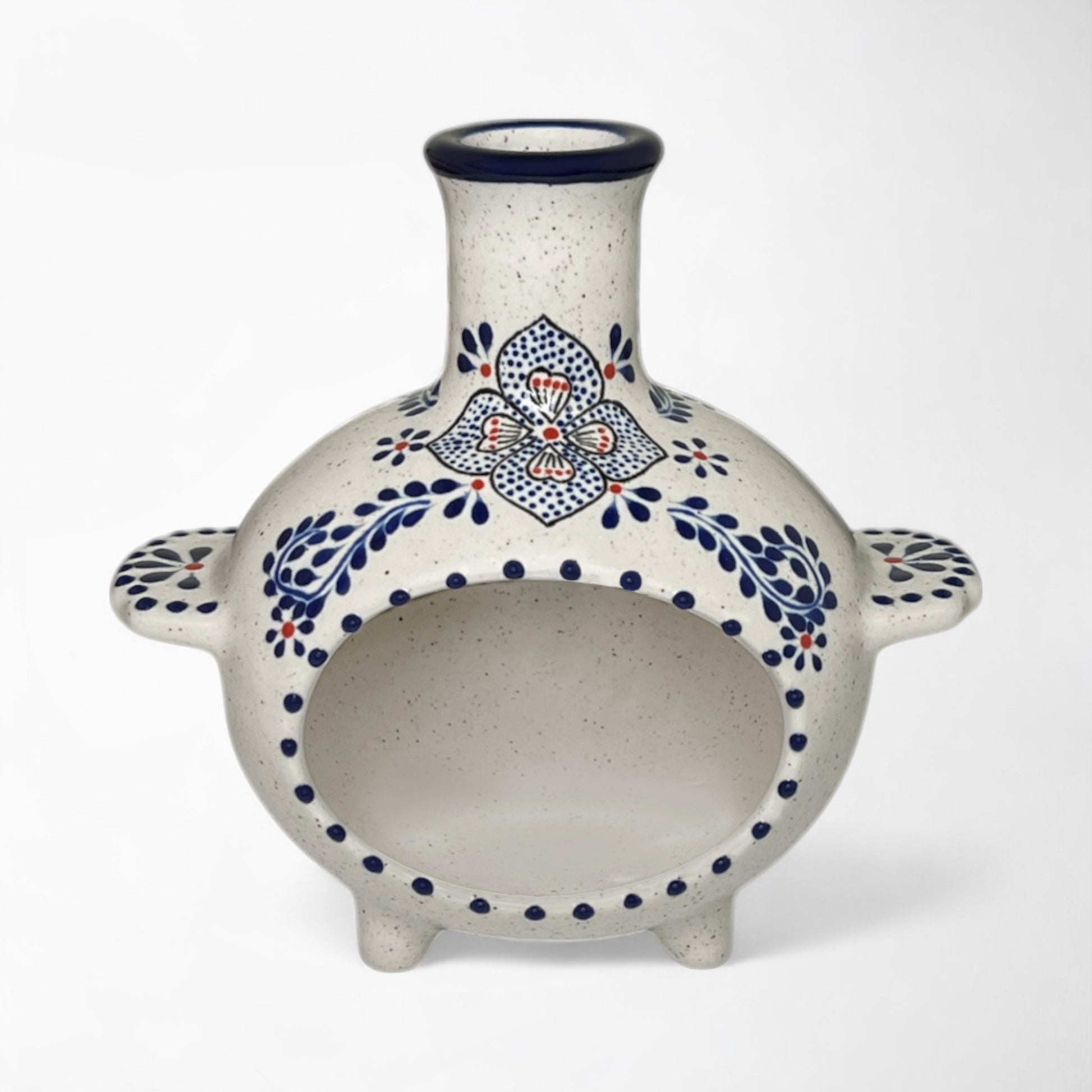Ceramic chiminea with blue and red floral patterns. holds sage bundles, palo santo wood, or incense cones. 