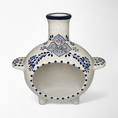 Ceramic chiminea with blue and red floral patterns. holds sage bundles, palo santo wood, or incense cones. 