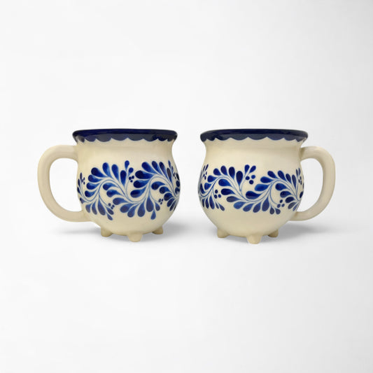 Hand-painted mug set ideal for gifting, featuring vibrant blue designs and smooth ceramic finish. Hand painted and made in Mexico