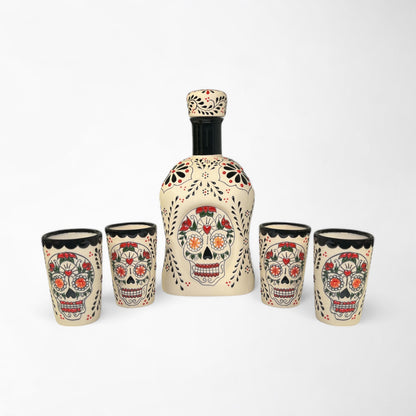 Decorative tequila decanter and shot glasses with skull design. Talavera design. Handmade and painted