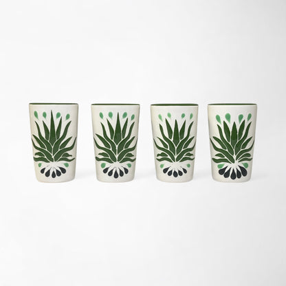 Set of four hand-painted ceramic shot glasses featuring green agave design, perfect for tequila or mezcal