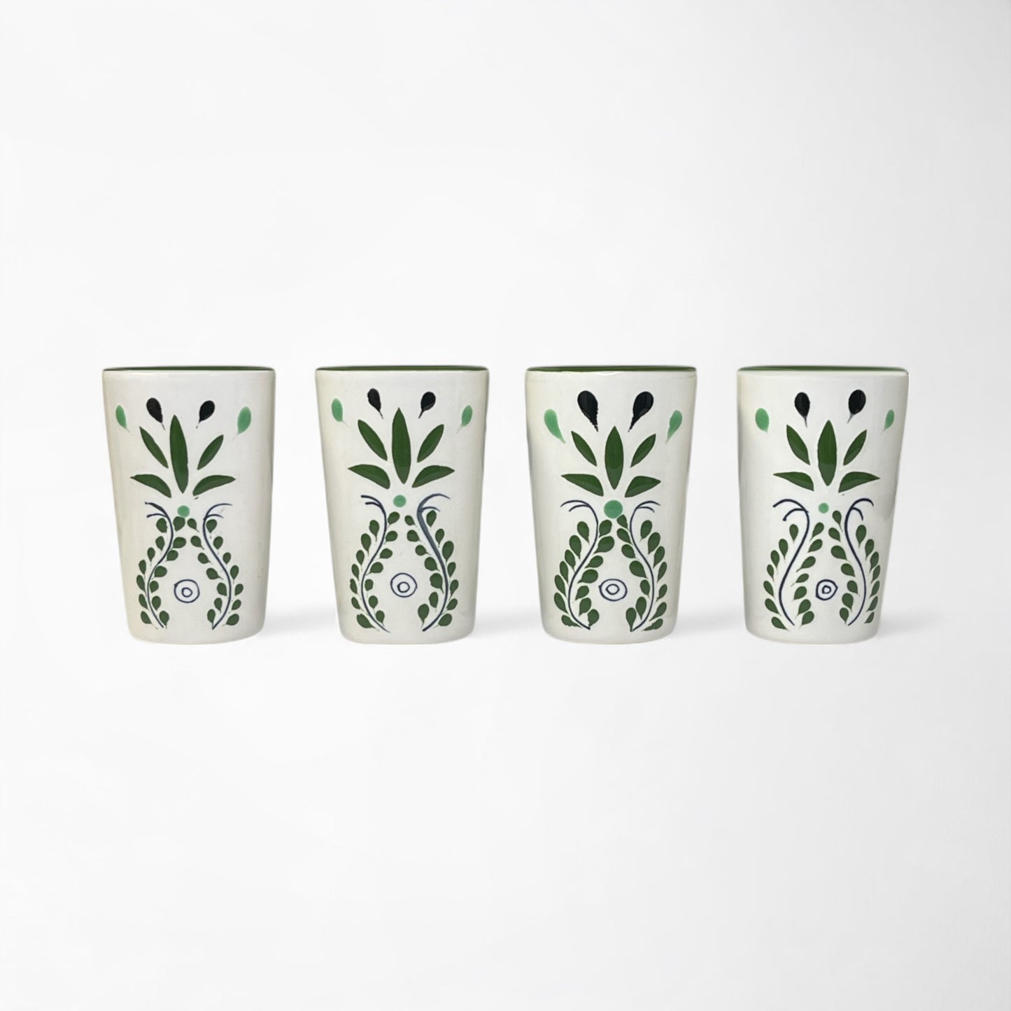 Handmade ceramic barware set, four shot glasses with traditional Mexican green agave design