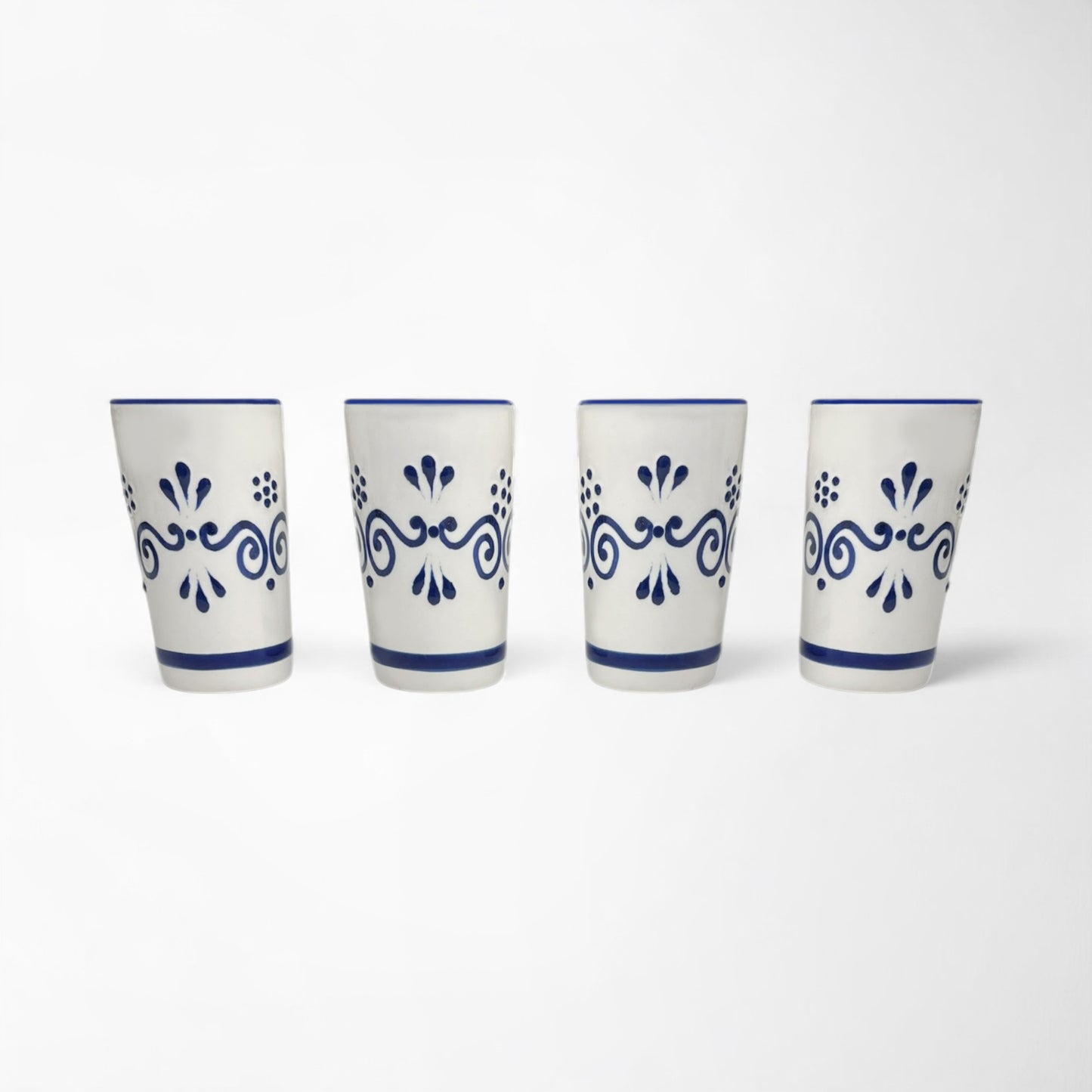 Set of four hand-painted ceramic shot glasses, perfect for tequila, mezcal, or cocktails
