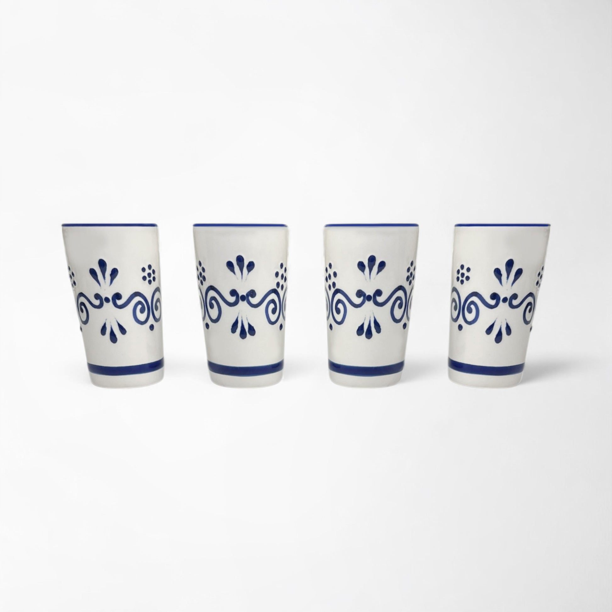 Set of four hand-painted ceramic shot glasses, perfect for tequila, mezcal, or cocktails