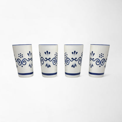 Four-piece hand-painted ceramic shot glass set, unique gift idea for friends and family. Made in Mexico